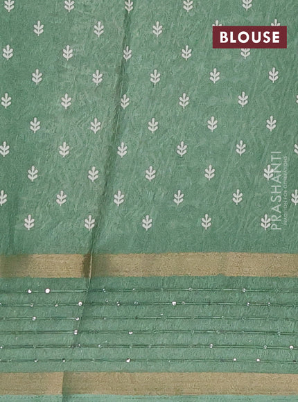Semi dola saree green with allover warli prints and zari woven sequin work border