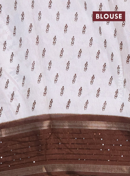 Semi dola saree off white and brown with allover warli prints and zari woven sequin work border