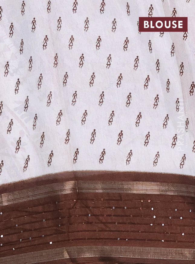 Semi dola saree off white and brown with allover warli prints and zari woven sequin work border