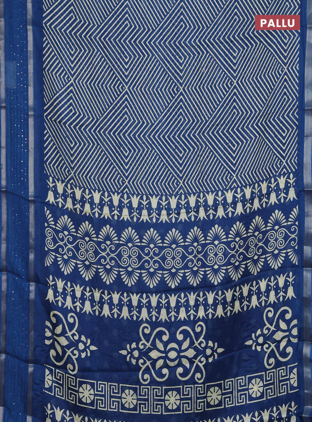 Semi dola saree peacock blue with allover geometric prints and zari woven sequin work border