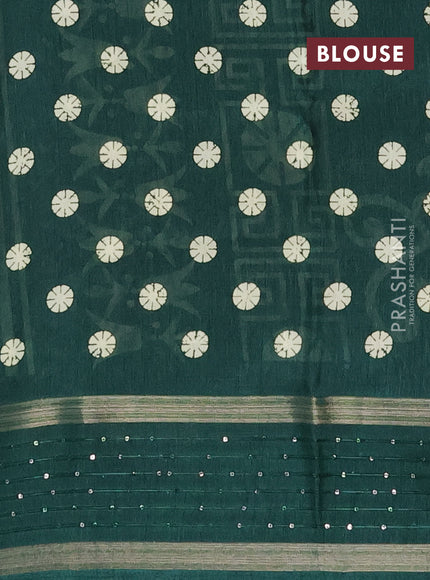 Semi dola saree green with allover geometric prints and zari woven sequin work border