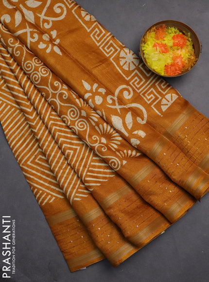 Semi dola saree mustard yellow with allover geometric prints and zari woven sequin work border