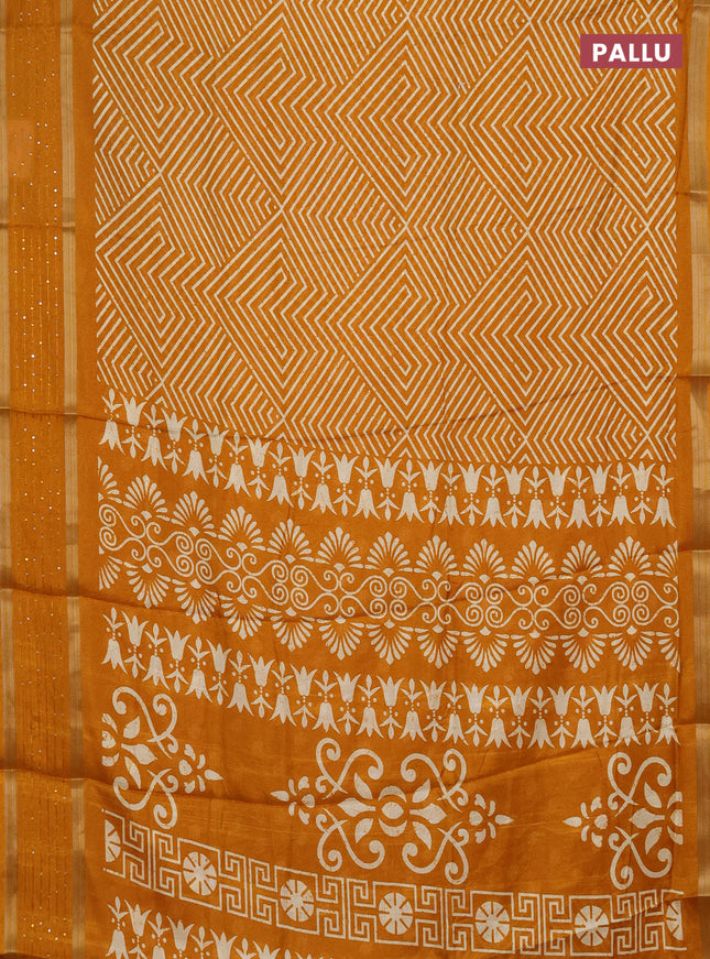 Semi dola saree mustard yellow with allover geometric prints and zari woven sequin work border
