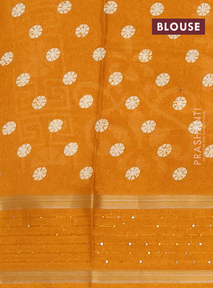 Semi dola saree mustard yellow with allover geometric prints and zari woven sequin work border