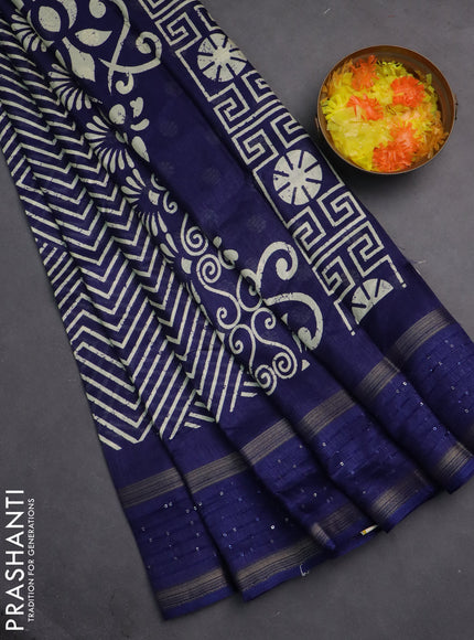 Semi dola saree blue with allover geometric prints and zari woven sequin work border