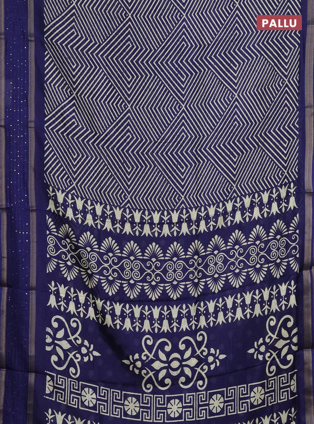 Semi dola saree blue with allover geometric prints and zari woven sequin work border