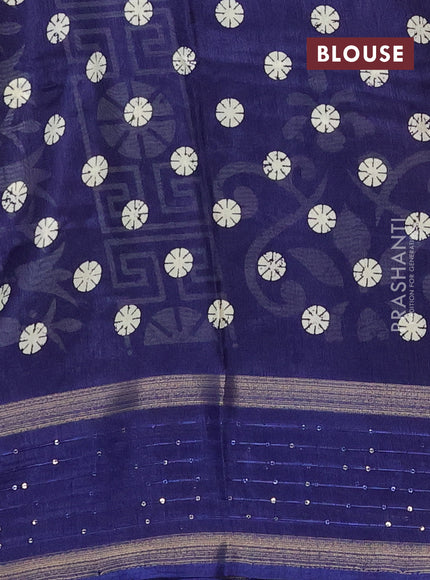 Semi dola saree blue with allover geometric prints and zari woven sequin work border