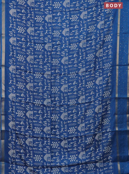 Semi dola saree cs blue with allover warli prints and zari woven sequin work border