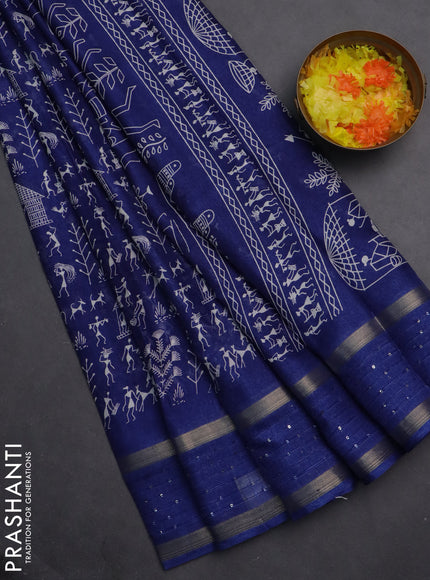Semi dola saree blue with allover warli prints and zari woven sequin work border