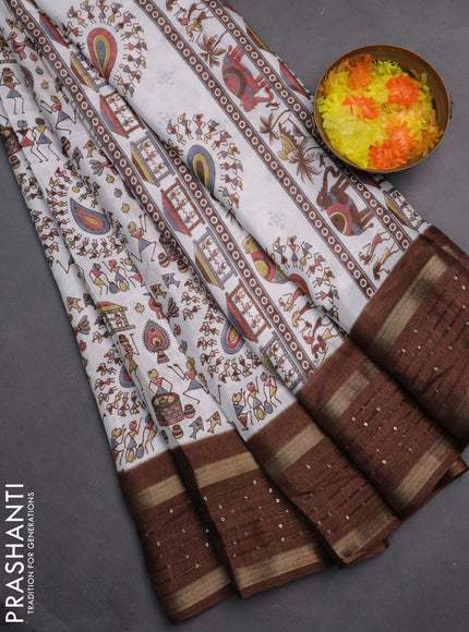 Semi dola saree off white and brown with warli prints and zari woven sequin work border
