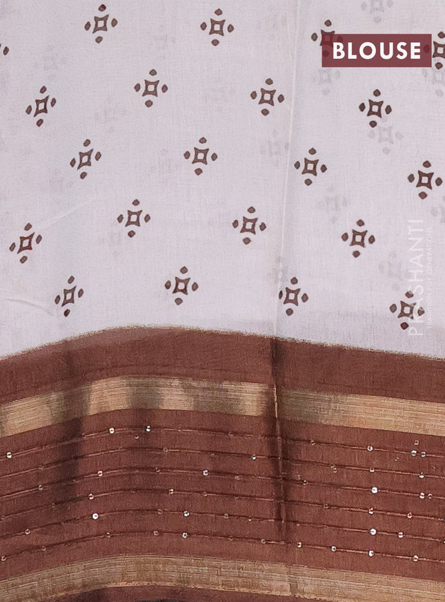 Semi dola saree off white and brown with warli prints and zari woven sequin work border