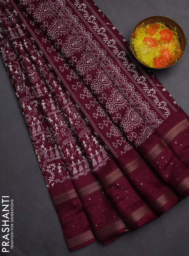 Semi dola saree wine shade with warli prints and zari woven sequin work border