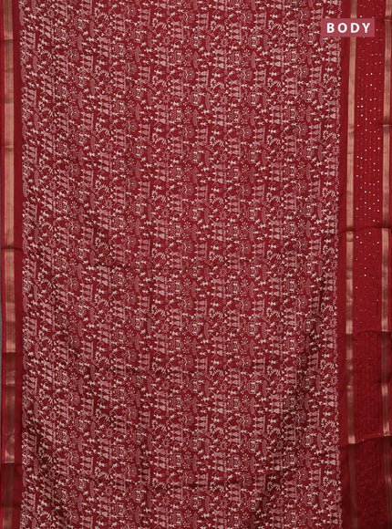 Semi dola saree maroon with warli prints and zari woven sequin work border