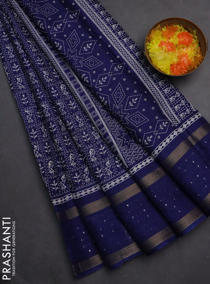 Semi dola saree blue with allover warli prints and zari woven sequin work border