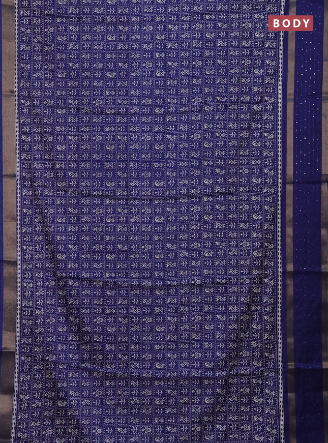 Semi dola saree blue with allover warli prints and zari woven sequin work border