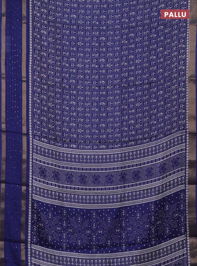 Semi dola saree blue with allover warli prints and zari woven sequin work border