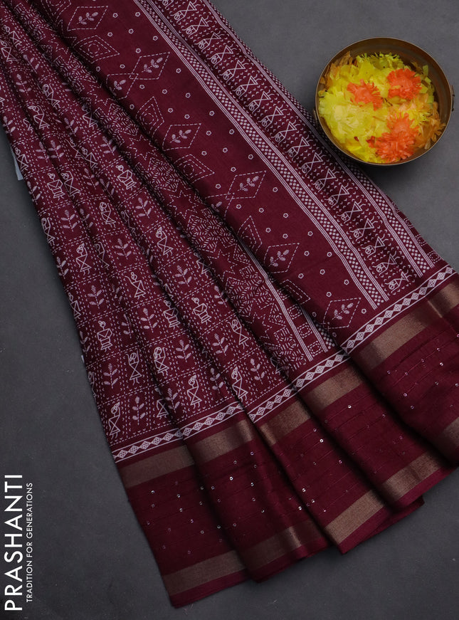 Semi dola saree wine shade with allover warli prints and zari woven sequin work border