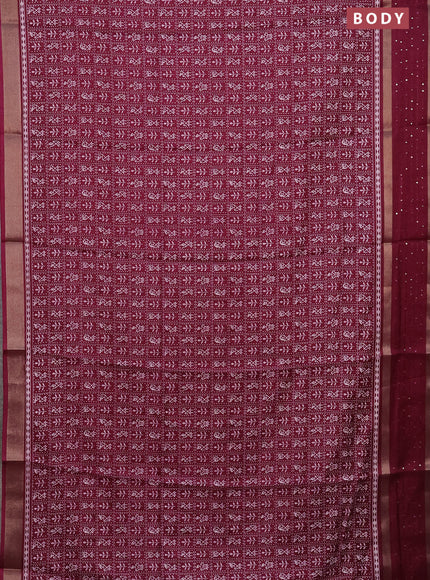 Semi dola saree wine shade with allover warli prints and zari woven sequin work border