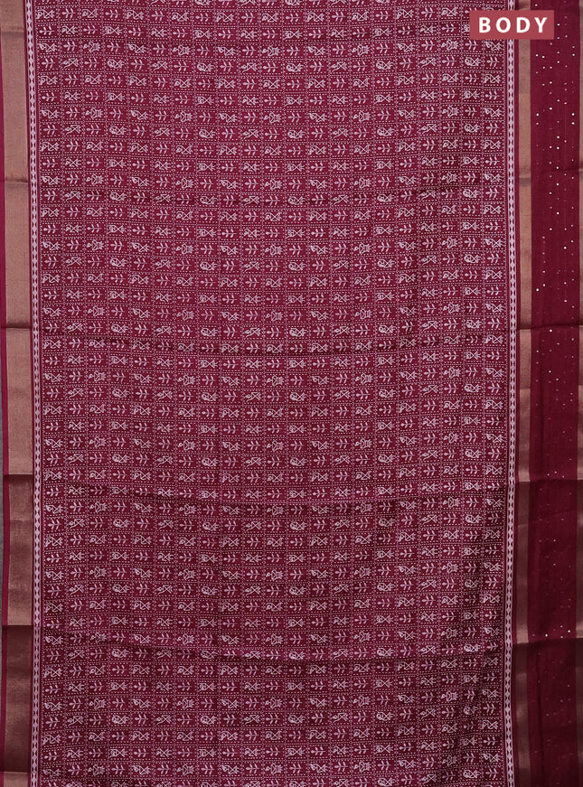 Semi dola saree wine shade with allover warli prints and zari woven sequin work border