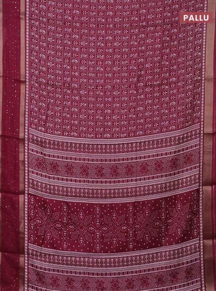 Semi dola saree wine shade with allover warli prints and zari woven sequin work border