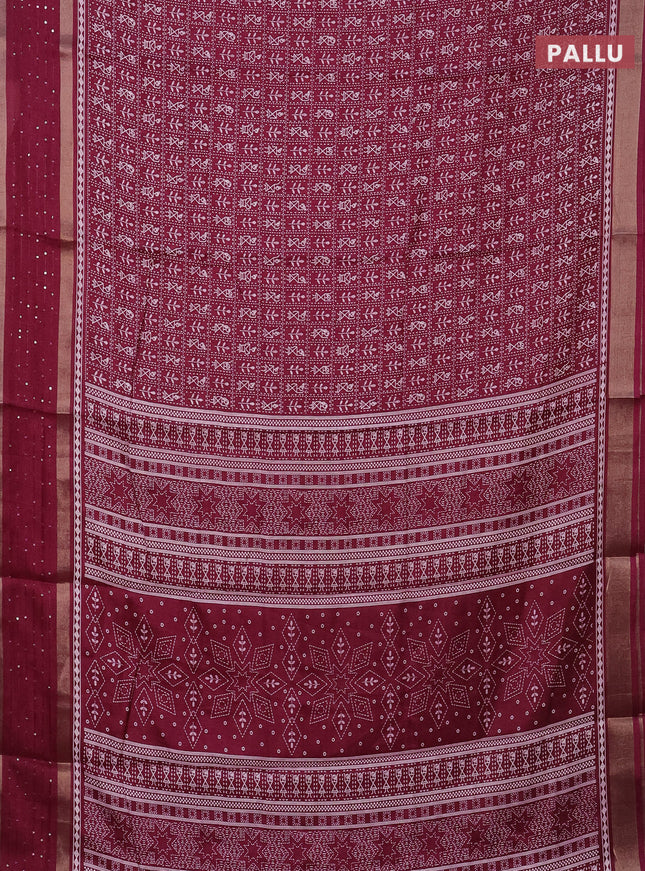 Semi dola saree wine shade with allover warli prints and zari woven sequin work border