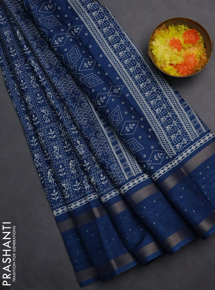 Semi dola saree cs blue with allover warli prints and zari woven sequin work border