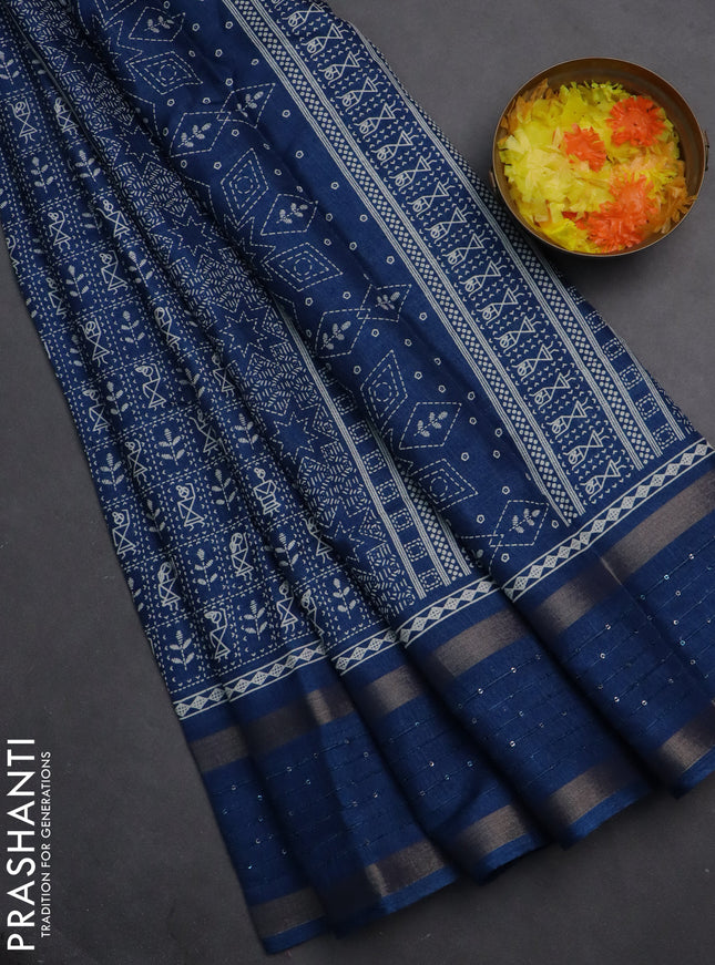 Semi dola saree cs blue with allover warli prints and zari woven sequin work border