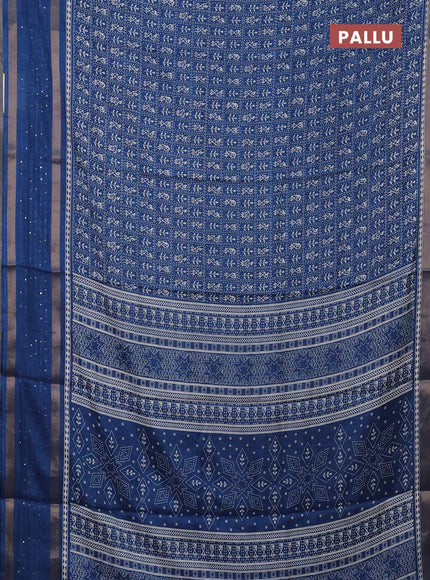 Semi dola saree cs blue with allover warli prints and zari woven sequin work border