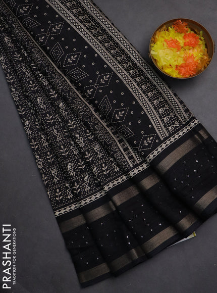 Semi dola saree black with allover warli prints and zari woven sequin work border