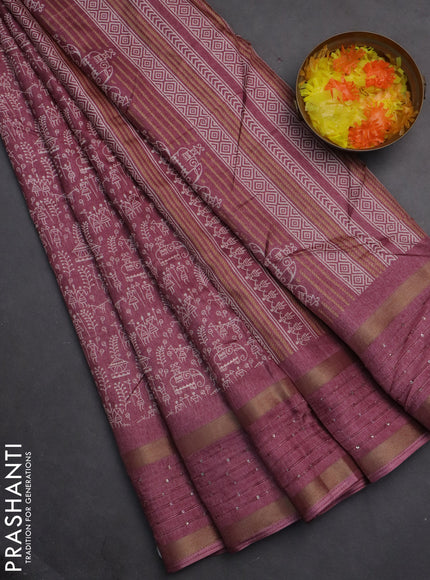 Semi dola saree mauve pink with allover warli prints and zari woven sequin work border