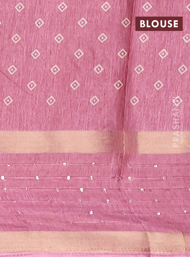 Semi dola saree mauve pink with allover warli prints and zari woven sequin work border