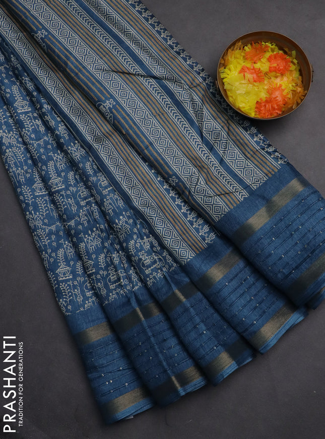Semi dola saree cs blue with allover warli prints and zari woven sequin work border