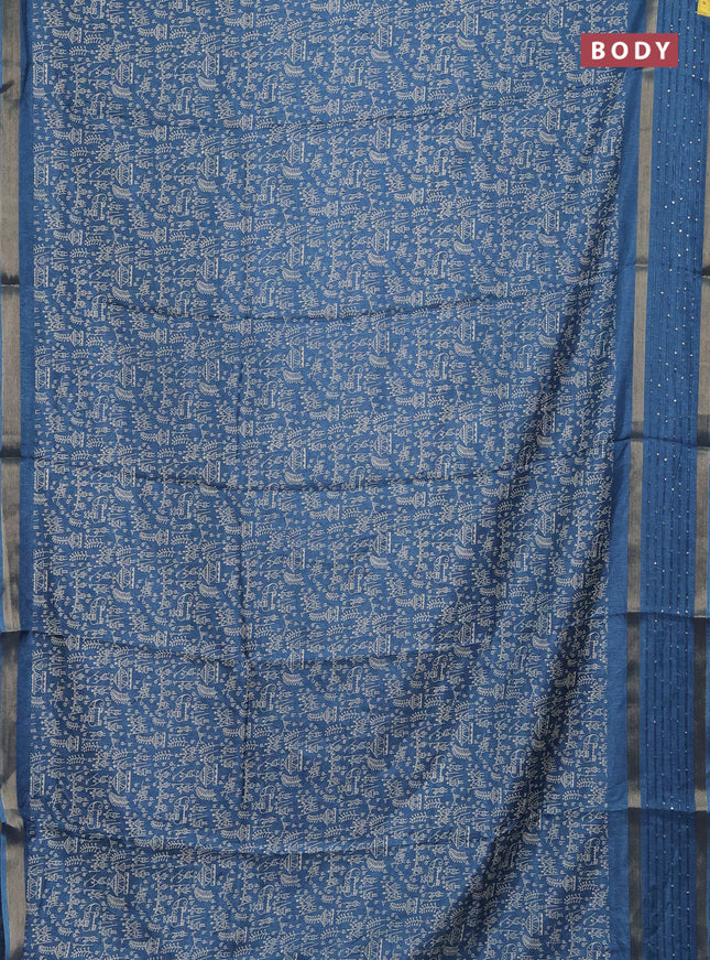 Semi dola saree cs blue with allover warli prints and zari woven sequin work border