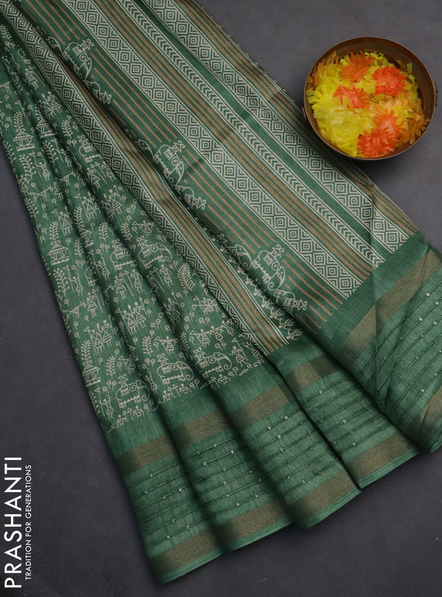 Semi dola saree pastel green with allover warli prints and zari woven sequin work border