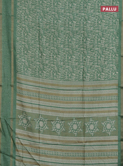 Semi dola saree pastel green with allover warli prints and zari woven sequin work border