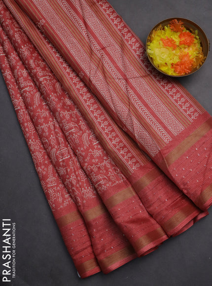 Semi dola saree peach shade with allover warli prints and zari woven sequin work border