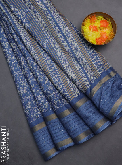 Semi dola saree blue with allover warli prints and zari woven sequin work border