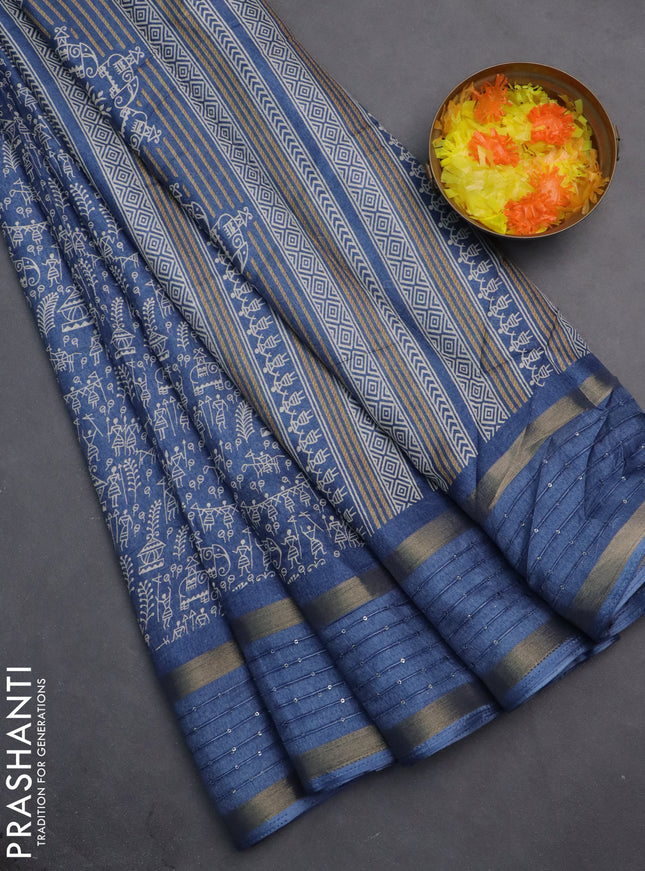 Semi dola saree blue with allover warli prints and zari woven sequin work border