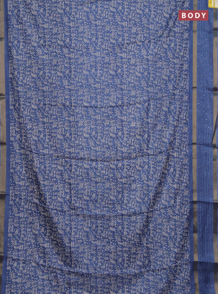 Semi dola saree blue with allover warli prints and zari woven sequin work border