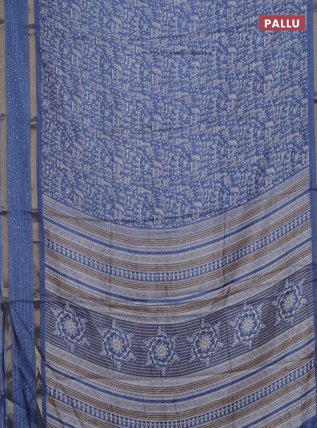 Semi dola saree blue with allover warli prints and zari woven sequin work border