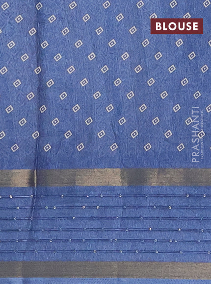 Semi dola saree blue with allover warli prints and zari woven sequin work border