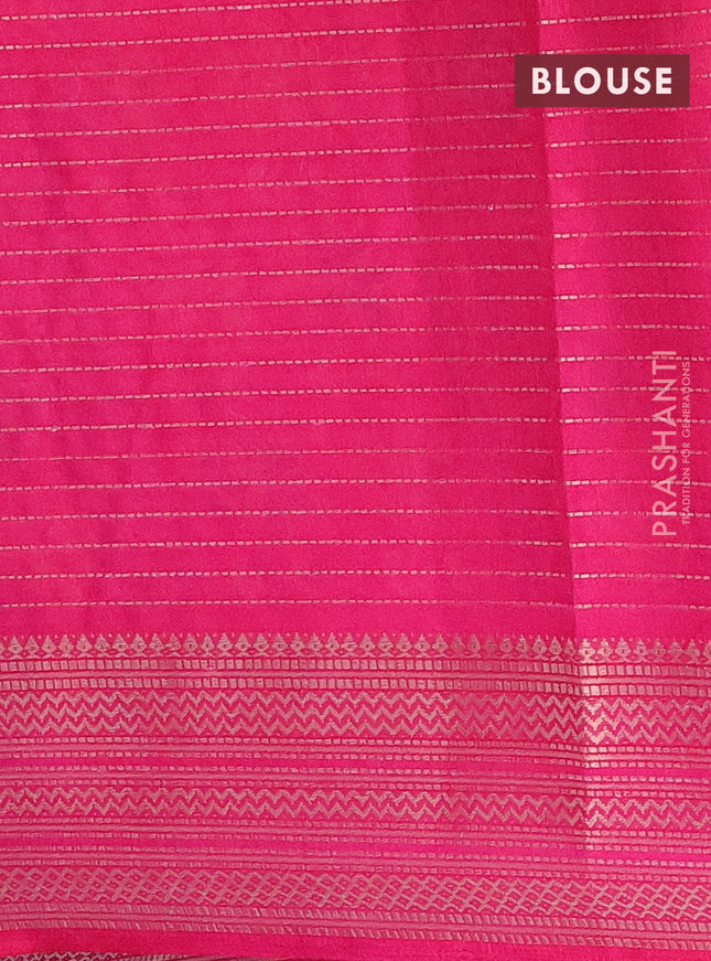 Semi dola saree cs blue and pink with allover zari weaves & floral prints and zari woven border