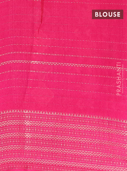 Semi dola saree green and pink with allover zari weaves & floral prints and zari woven border
