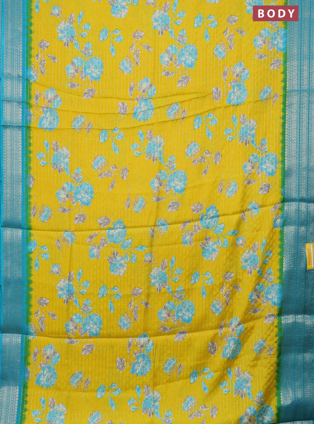 Semi dola saree lime yellow and teal blue with allover zari weaves & floral prints and zari woven border