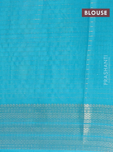 Semi dola saree lime yellow and teal blue with allover zari weaves & floral prints and zari woven border