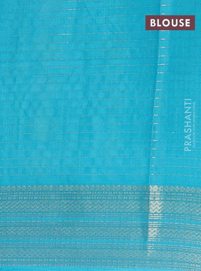 Semi dola saree lime yellow and teal blue with allover zari weaves & floral prints and zari woven border