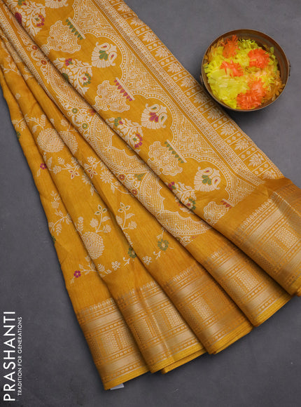 Semi dola saree mustard yellow with allover prints and zari woven border