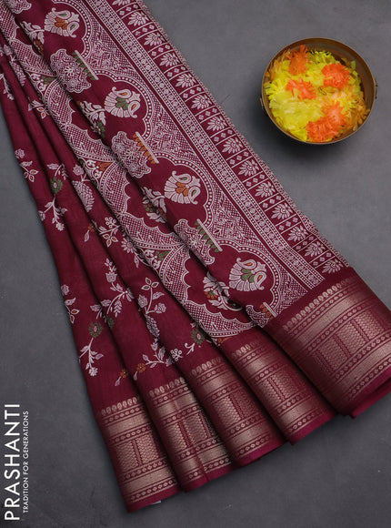 Semi dola saree wine shade with allover prints and zari woven border
