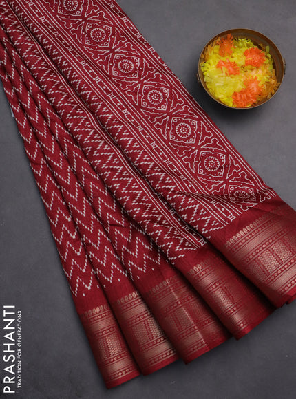 Semi dola saree maroon with allover zig zag prints and zari woven border