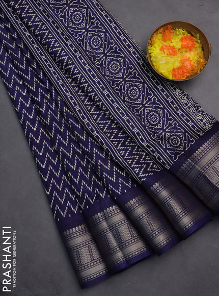 Semi dola saree navy blue with allover zig zag prints and zari woven border